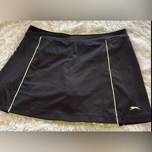 Slazenger woman’s golf skort size M - black with green detail